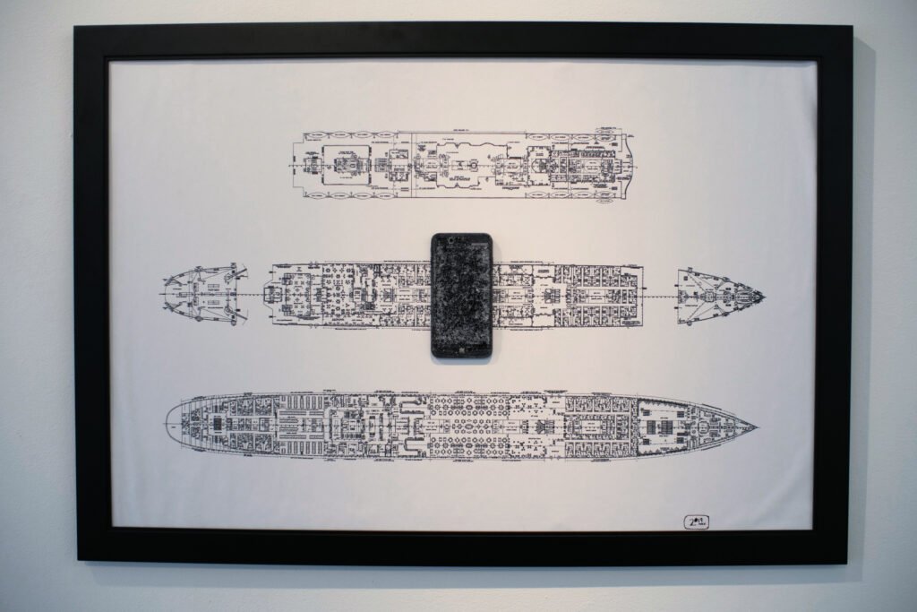 RMS Titanic and iPhone is an assemblage sculpture by AM Fuller. Drawing and sculpture by Andrew Miguel Fuller.