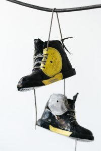 Out with the new! - Fine art sculpture by Andrew Miguel Fuller - Assemblage artwork by Andy Fuller - vinyl records, shoe laces.