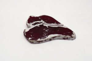 Resin sculpture titled after Ravi Shankar song, West eats meat, by Andrew Miguel Fuller. Dyed resin by AM Andy Fuller