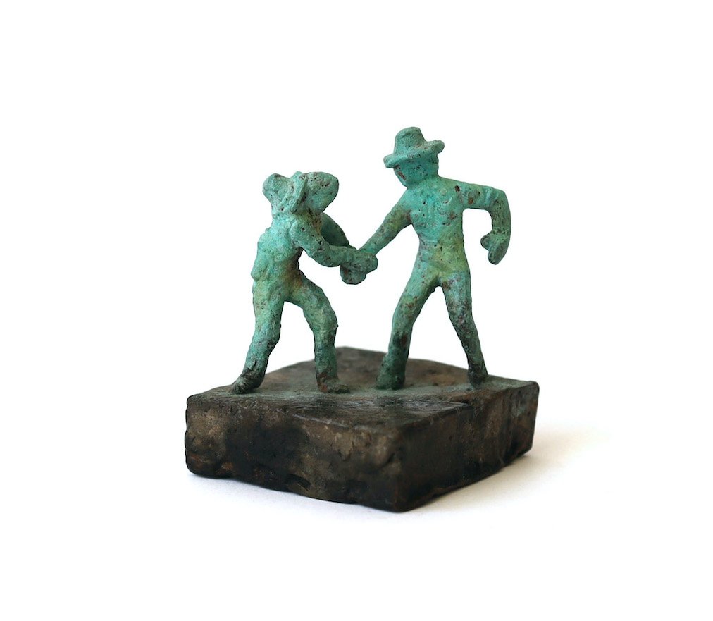 Bronze artwork by Andrew Miguel Fuller. Aggressive handshake, an absurd cowboy sculpture by AM Andy Fuller