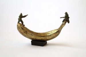 Bronze artwork by Andrew Miguel Fuller. See-saw, an absurd cowboy sculpture by AM Andy Fuller