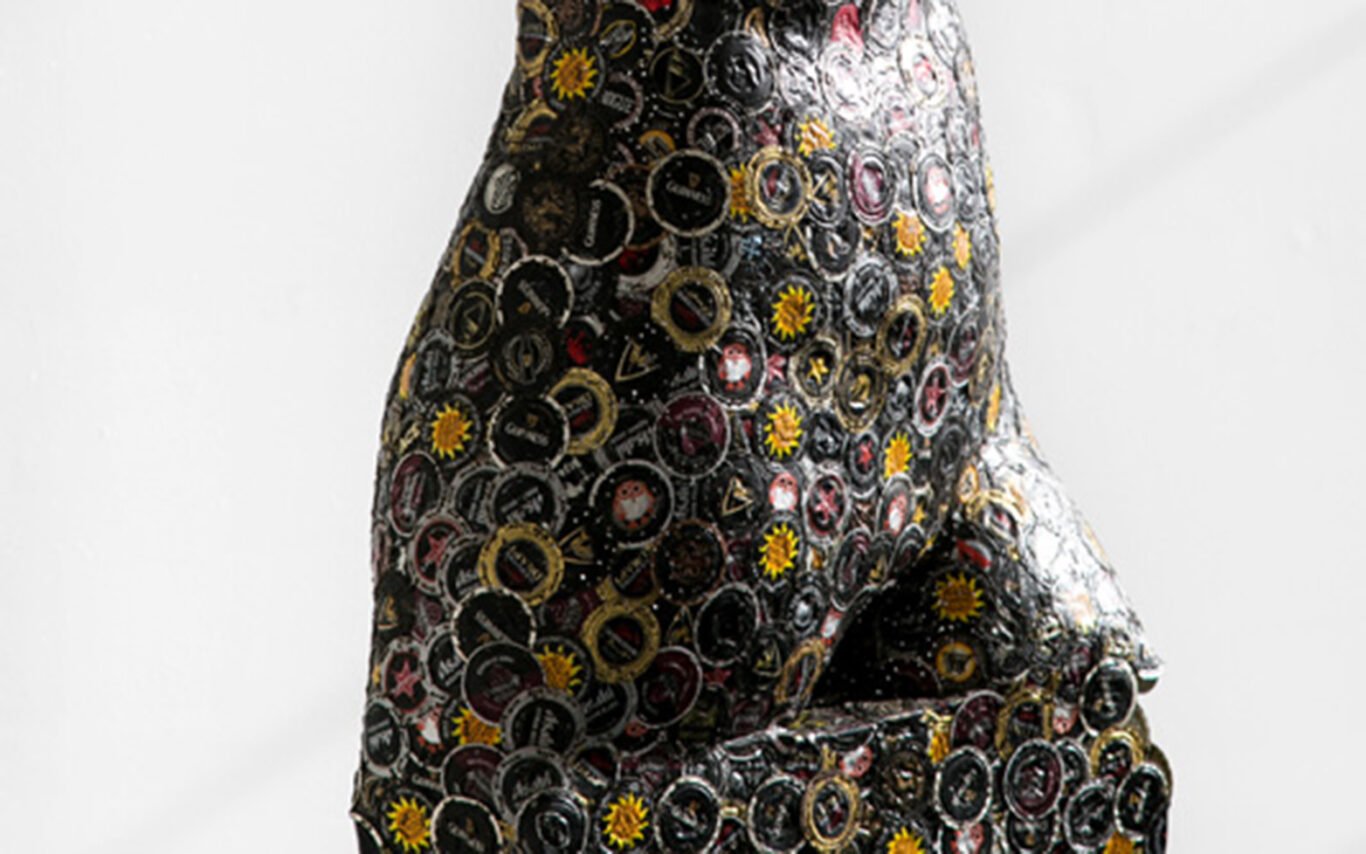 Untitled (torso) bottle cap assemblage sculpture by AM Fuller. Artwork by Andrew Miguel Fuller.